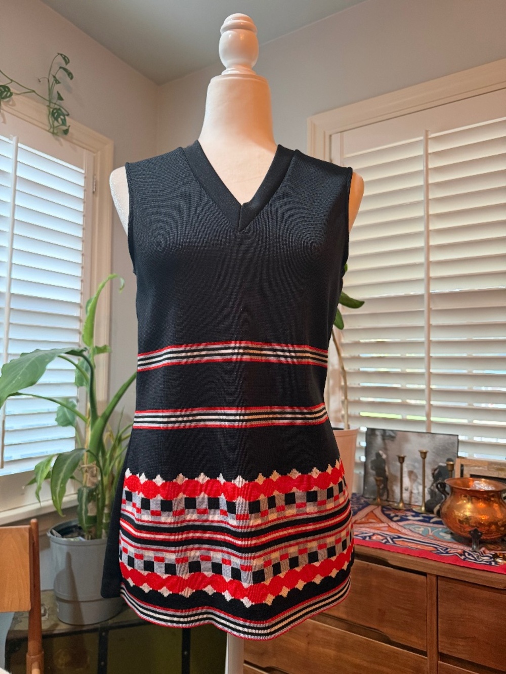 Vintage 1970’s polyester black and red V neck sleeveless top.